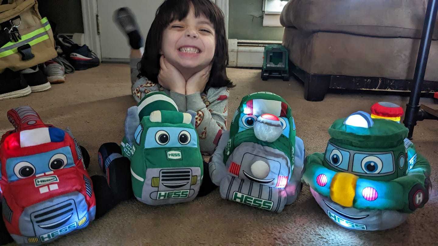 boy with full plush collection